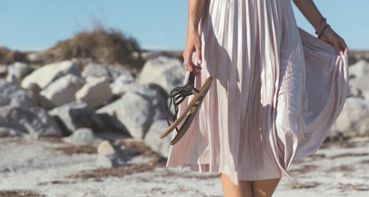 a person walking on a beach